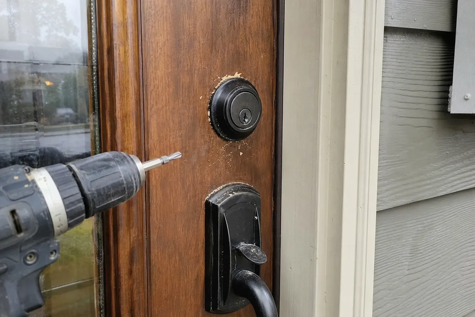 New deadbolt being installed in a front door