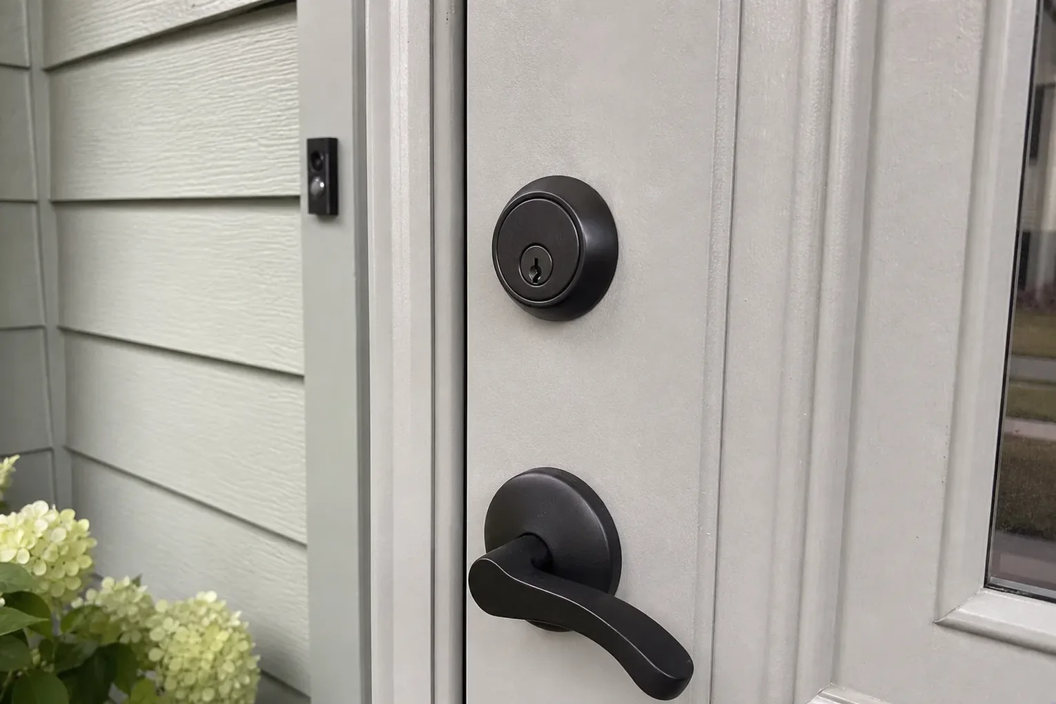 New deadbolt being installed in a front door in Deland, FL